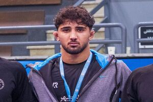 کشتی‌گیر کرجی در حملات نظامی دشمن شهید شد