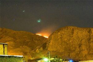 طاق بستان در میان شعله های آتش