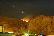 طاق بستان در میان شعله های آتش