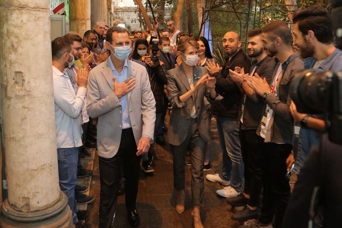 بشار اسد و همسرش
