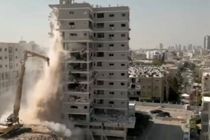 آغاز تخریب ساختمان آسیب دیده از حملات موشکی ایران در بیت یام + فیلم