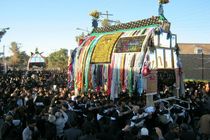 اجرای آیین نخل گردانی همراه با تعزیه خوانی در گناباد