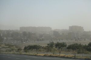 تهران در باران و گردوخاک می رود
