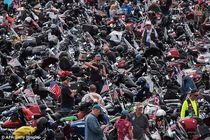 موتور سواری وزیر خارجه آمریکا در بزرگداشت سربازان آمریکایی