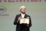 جان تراولتا در جشنواره فیلم کن غافلگیر شد